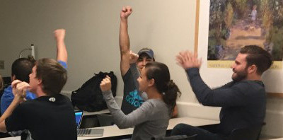 Students experiencing achievement during a class challenge