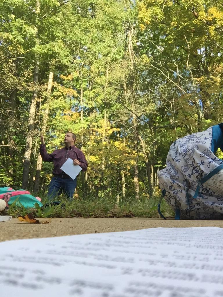 Holding class in an outdoor setting among trees